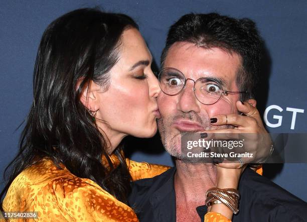 Lauren Silverman and Simon Cowell arrives at the "America's Got Talent" Season 14 Live Show Red Carpet at Dolby Theatre on September 17, 2019 in...