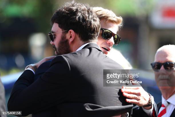 Paddy McCartin and Nick Riewoldt arrive at the Danny Frawley Funeral Service on September 18, 2019 in Melbourne, Australia. Frawley died on 9th...