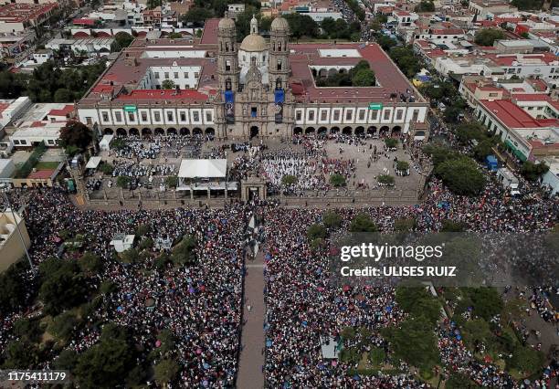 Catholic faithful gather to receive the image of the Virgin of Zapopan, during the annual pilgrimage to the Basilica of Zapopan, in Zapopan, state of...