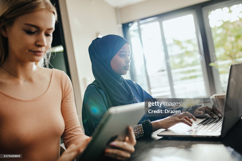 Portrait of multi-ethnic business team in coworking space