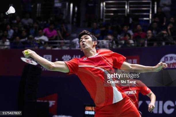 Lee Yong Dae and Kim Gi Jung of Korea compete in the Men's Doubles first round match against Ong Yew Sin and Teo Ee Yi of Malaysia on day two of the...
