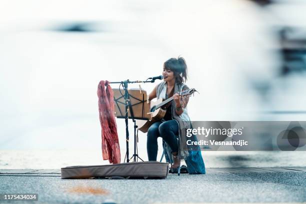 street musician - street artist stock pictures, royalty-free photos & images