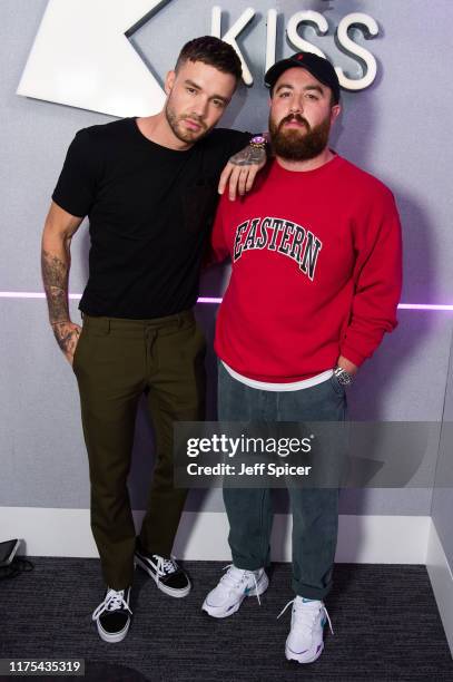 Liam Payne , pictured with Tom Green, visits the Kiss FM Studio's on September 03, 2019 in London, England.