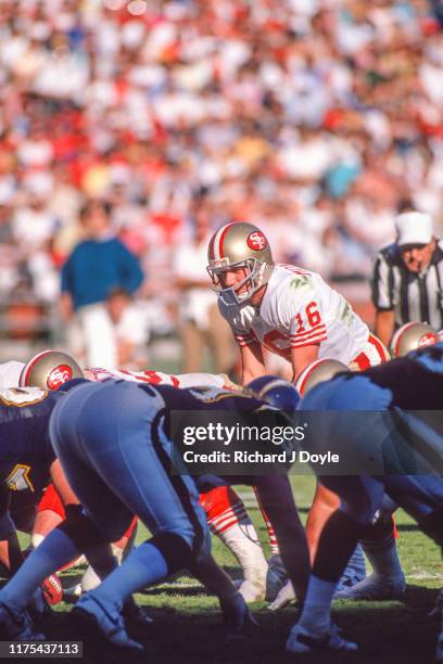 Joe Montana preparing to take the snap from center. San Francisco 49ers 48 vs San Diego Chargers 10 at Jack Murphy Stadium in San Diego, California.