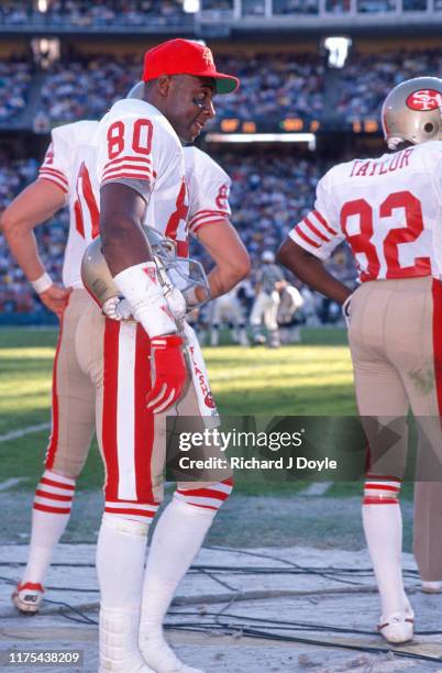 Jerry Rice on the sidelines with PR John Taylor. San Francisco 49ers 48 vs San Diego Chargers 10 at Jack Murphy Stadium in San Diego, California.