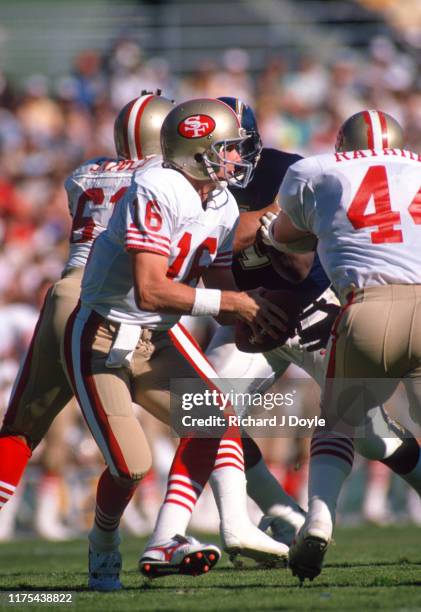 Joe Montana takes the snap from center. San Francisco 49ers 48 vs San Diego Chargers 10 at Jack Murphy Stadium in San Diego, California.