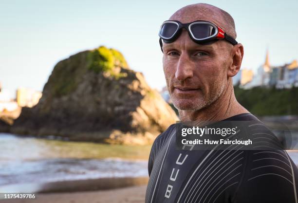 Gareth Thomas prepares to have a final swim ahead of IRONMAN Wales on September 14, 2019 in Tenby, Wales.