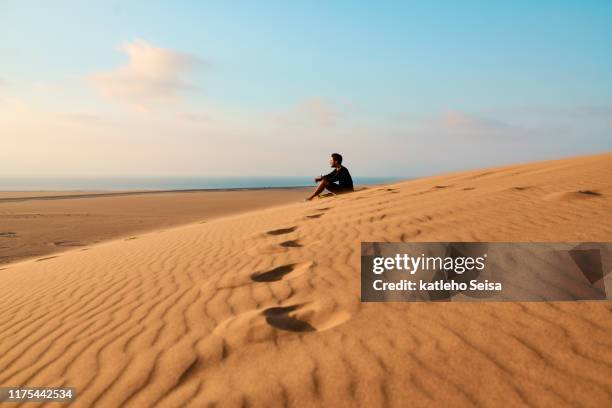 when you're in the desert, you look into infinity - one man only stock pictures, royalty-free photos & images