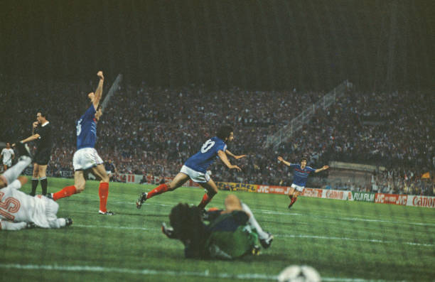 French professional footballer Michel Platini turns away after scoring the winning goal for the France national team after 119 minutes of play in the...