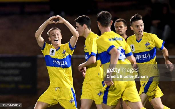 Fraser Hills of the Strikers celebrates scoring a goal during the FFA Cup 2019 Quarter Finals match between the Brisbane Strikers and Moreland Zebras...