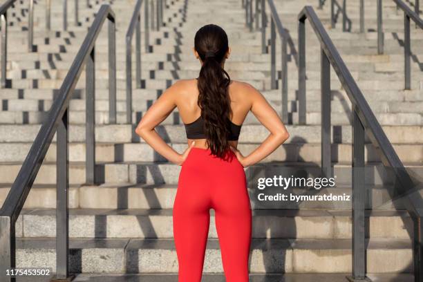 preparing for workout - woman bum stock pictures, royalty-free photos & images