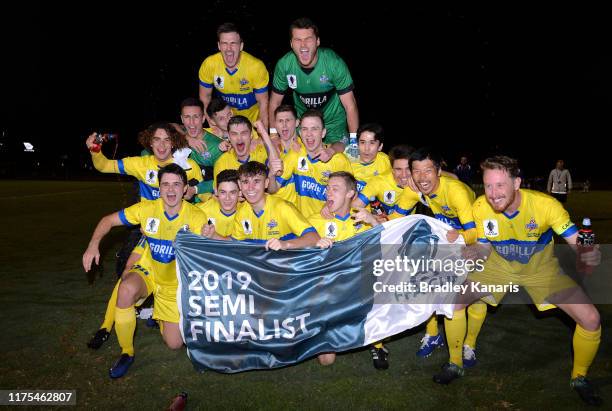 The Strikers celebrate victory after winning the FFA Cup 2019 Quarter Finals match between the Brisbane Strikers and Moreland Zebras FC at Perry Park...