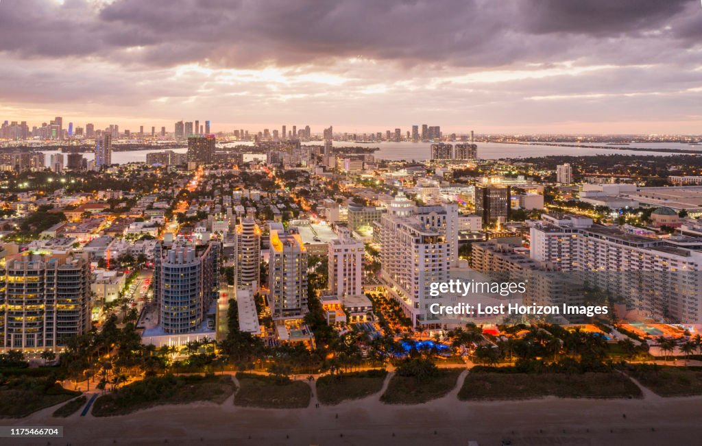 Cityscape with skyscrapers at dusk, aerial view, Miami Beach, Florida, United States