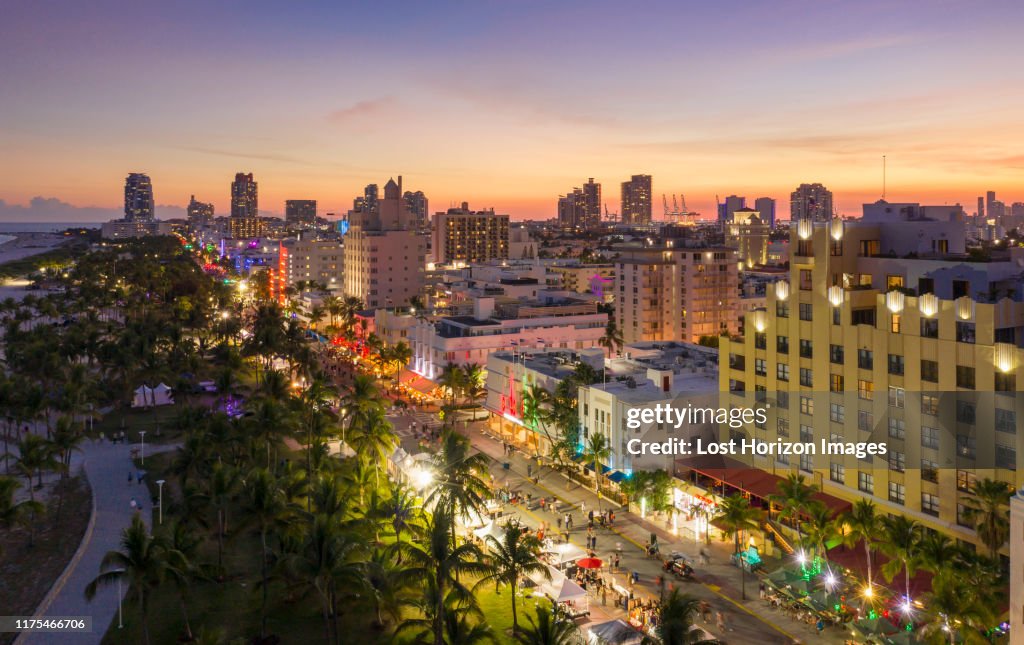 Cityscape with skyscraper skyline at dusk, aerial view, Miami Beach, Florida, United States