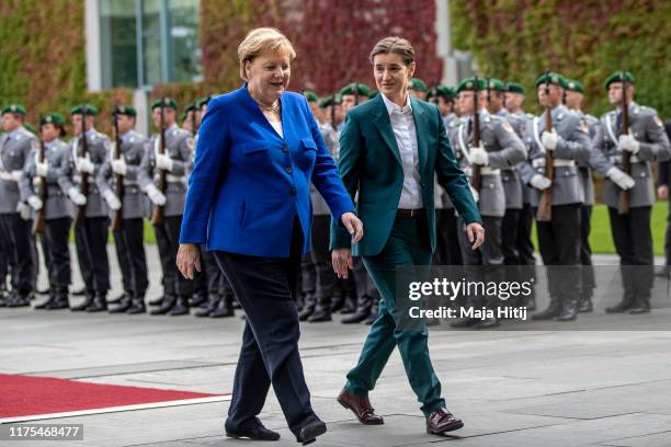 German Chancellor Angela Merkel receives Serbian Prime Minister Ana Brnabic with military honors at the Chancellery in Berlin on September 18, 2019...