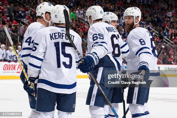 Ilya Mikheyev of the Toronto Maple Leafs celebrates his second period goal with teammates Morgan Rielly, Alexander Kerfoot and Jake Muzzin during an...