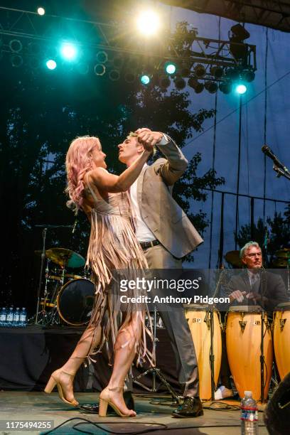 Ari Shapiro performs on stage with Storm Large of Pink Martini at McMenamins Edgefield in Troutdale, Oregon, USA on 17th August 2019.