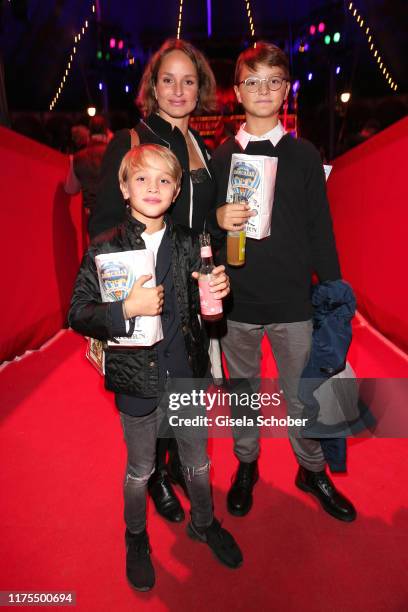 Lara Joy Koerner and her son Neo Ariel and Remo during the premiere of Circus Roncalli's "Storyteller - Gestern - Heute - Morgen" on October 12, 2019...