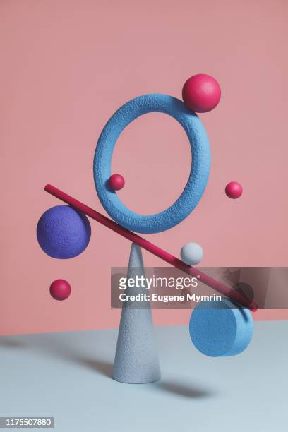 Abstract multi-colored objects on colored background