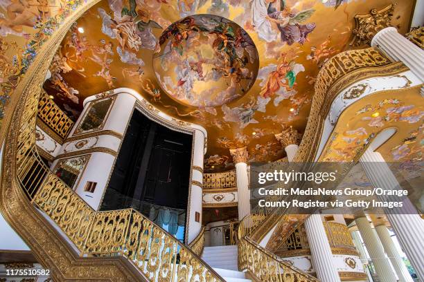 View up the stairway and ceiling from the lobby in the former Trinity Broadcasting Network building located on Bear Street and the 405 freeway in...