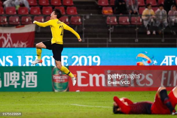 Gao Zhunyi of Guangzhou Evergrande celebrates victory during the AFC Champions League quarter final second leg match between Kashima Antlers and...
