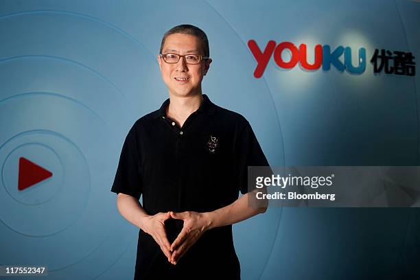Victor Koo, chief executive officer of Youku.com Inc., poses for a portrait in the company's offices in Beijing, China, on Tuesday, June 28, 2011....