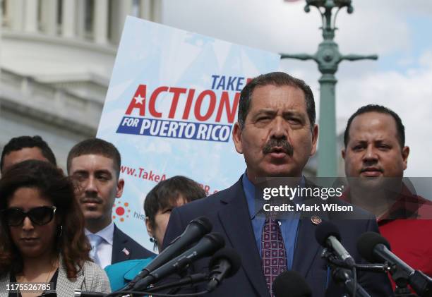 Rep. Jesus Garcia speaks during a news conference to call on President Trump and Congress to help Puerto Rico recover two years after the island was...