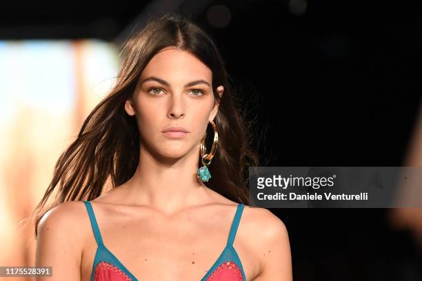 [Image: vittoria-ceretti-walks-the-runway-at-the...n2XBt8xFo=]