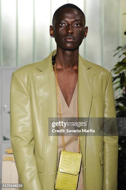 Model prepares backstage for Annakiki fashion show during the Milan Fashion Week Spring/Summer 2020 on September 18, 2019 in Milan, Italy.