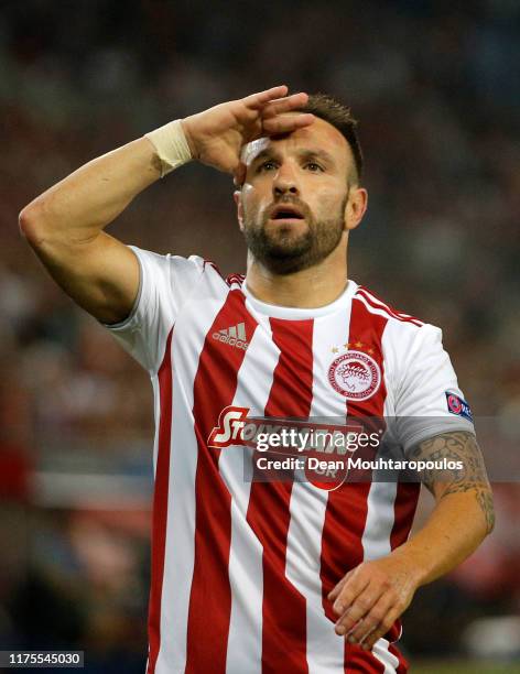 Mathieu Valbuena of Olympiacos celebrates after he scores his sides second goal from the penalty spot during the UEFA Champions League group B match...