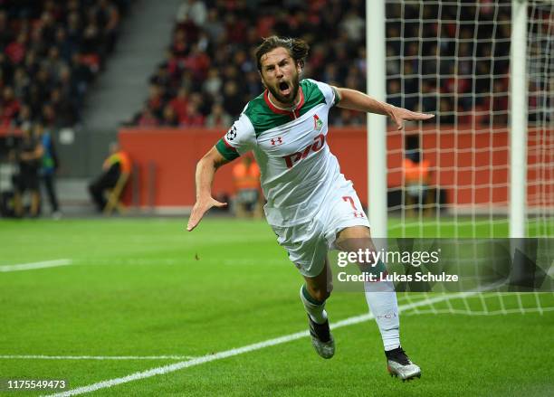 Grzegorz Krychowiak of Lokomotiv Moscow celebrates after scoring his team's first goal during the UEFA Champions League group D match between Bayer...