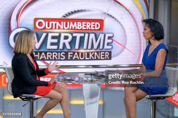 Former New York Times Executive Editor Jill Abramson with anchor Harris Faulkner as she visits "Outnumbered Overtime" at Fox News Channel Studios on...