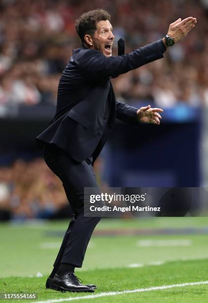 Diego Simeone, Manager of Atletico Madrid instructs his side during the UEFA Champions League group D match between Atletico Madrid and Juventus at...