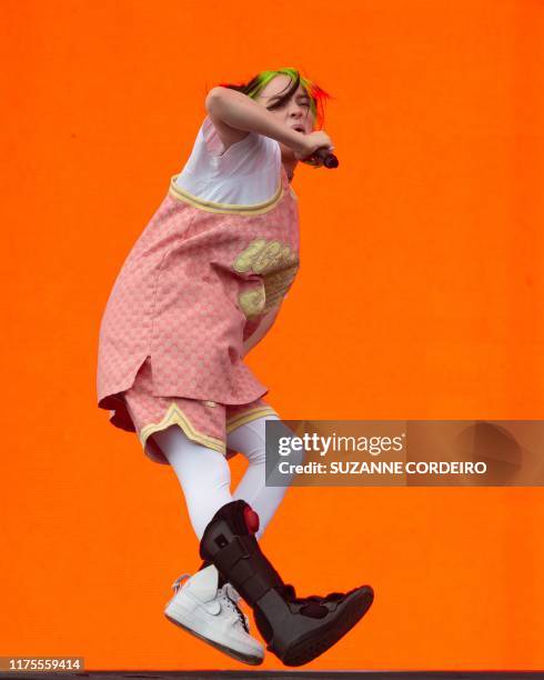 Singer-songwriter Billie Eilish performs wearing a leg brace at the Austin City Limits Music Festival on October 12, 2019 at Zilker Park in Austin,...