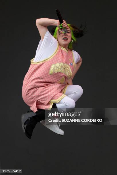 Singer-songwriter Billie Eilish performs wearing a leg brace at the Austin City Limits Music Festival on October 12, 2019 at Zilker Park in Austin,...
