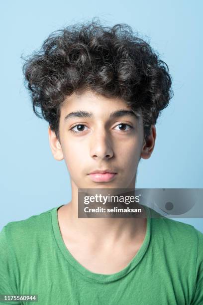 mugshot of adolescent boy - boy portrait studio stock pictures, royalty-free photos & images