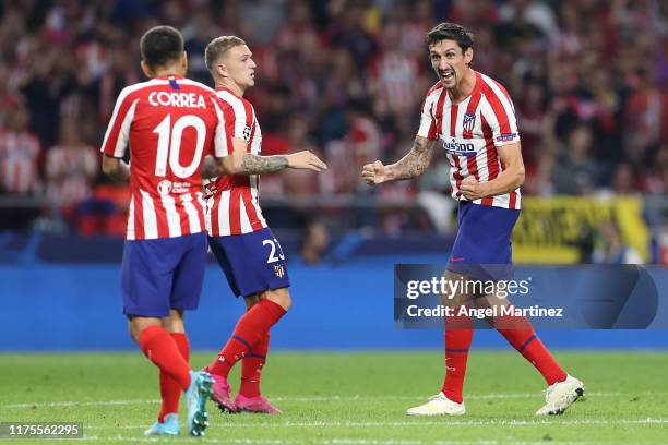 Stefan Savic of Atletico Madrid celebrates after scoring his sides first goal during the UEFA Champions League group D match between Atletico Madrid...