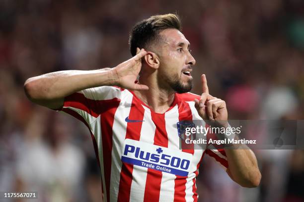 Hector Herrera of Atletico Madrid celebrates after scoring his sides second goal during the UEFA Champions League group D match between Atletico...