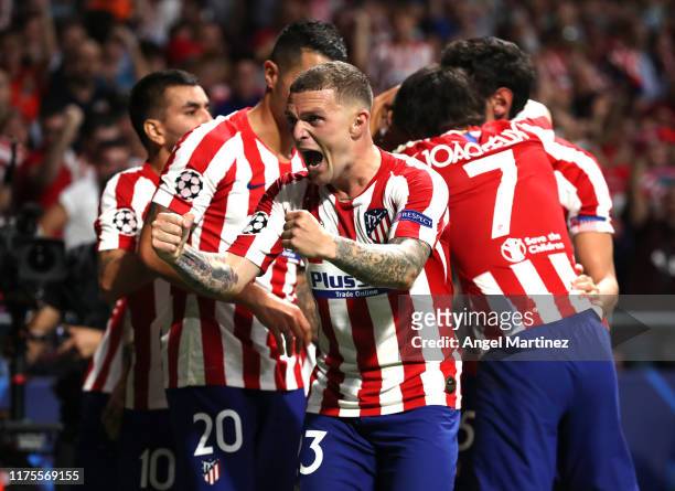 Kieran Trippier of Atletico Madrid celebrates his sides second goal scores by Hector Herrera during the UEFA Champions League group D match between...
