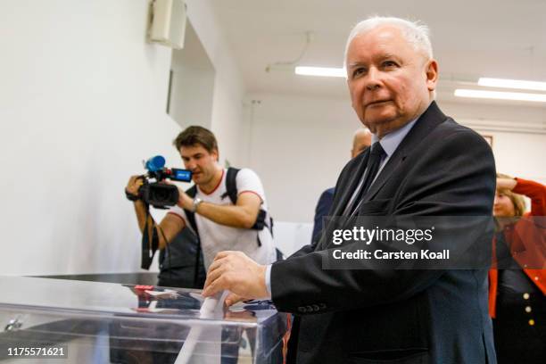 Jaroslaw Kaczynski, leader of the governing, right-wing Law and Justice political party , casts his ballot in the Polish parliamentary elections on...