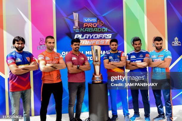 Captains Joginder Narwal of Dabang Delhi, Fazel Atrachali of U Mumba, Pawan Sehrawat of Bengaluru Bulls, Nitesh Kumar of U.P. Yoddha, Dharmaraj...