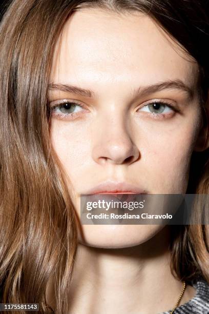 Cara Tylor poses during backstage for Alberta Ferretti fashion show during the Milan Fashion Week Spring/Summer 2020 on September 18, 2019 in Milan,...