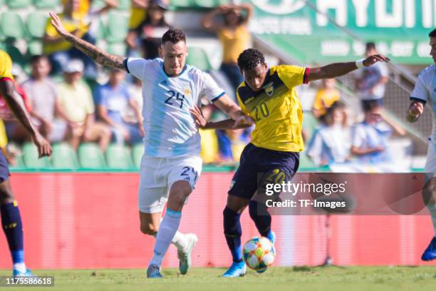 Lucas Ocampos of Argentina and Gonzalo Plata of Ecuador battle for the ball during the UEFA Euro 2020 qualifier between Ecuador and Argentina on...