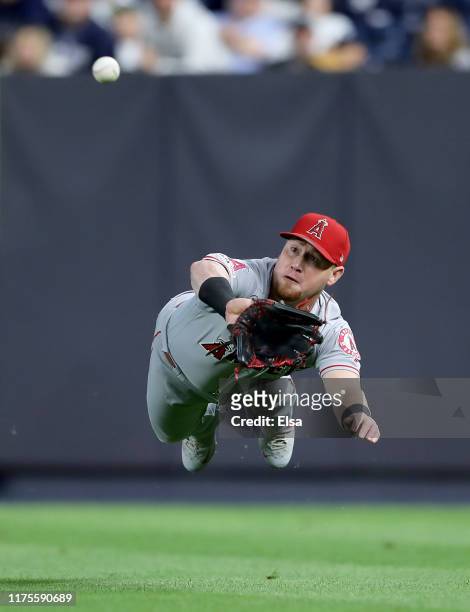 Kole Calhoun of the Los Angeles Angels makes the catch for the out on a hit by Luke Voit of the New York Yankees in the second inning at Yankee...