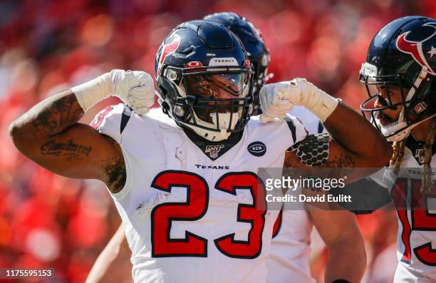 Carlos Hyde of the Houston Texans celebrates his second quarter rushing touchdown against the Kansas City Chiefs at Arrowhead Stadium on October 13,...