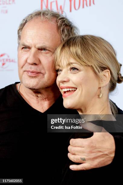 German actor Uwe Ochsenknecht and German actress Heike Makatsch attend the premiere of "Ich war noch niemals in New York" at Kino International on...
