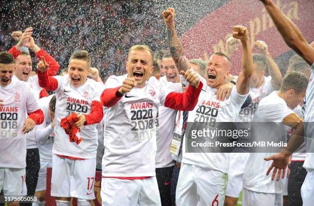 Kamil Grosicki and Jacek Goralski celebrate qualifying to Euro 2020 after the UEFA Euro 2020 qualifier between Poland and North Macedonia on October...