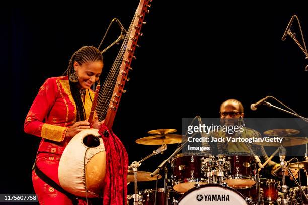British-Gambian musician, singer, and griot Sona Jobarteh plays kora during a World Music Institute concert at Symphony Space, New York, New York,...