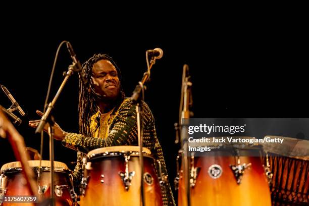 Senegalese musician Mamadou Sarr plays congas during a World Music Institute concert at Symphony Space, New York, New York, June 23, 2019.