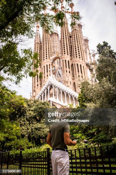 tourist in barcelona. - barcelona sagrada familia stock pictures, royalty-free photos & images